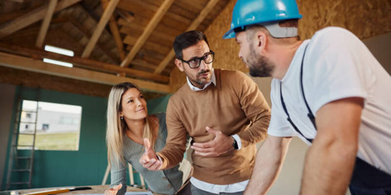 Couple reviewing home plans during consultation in Arizona