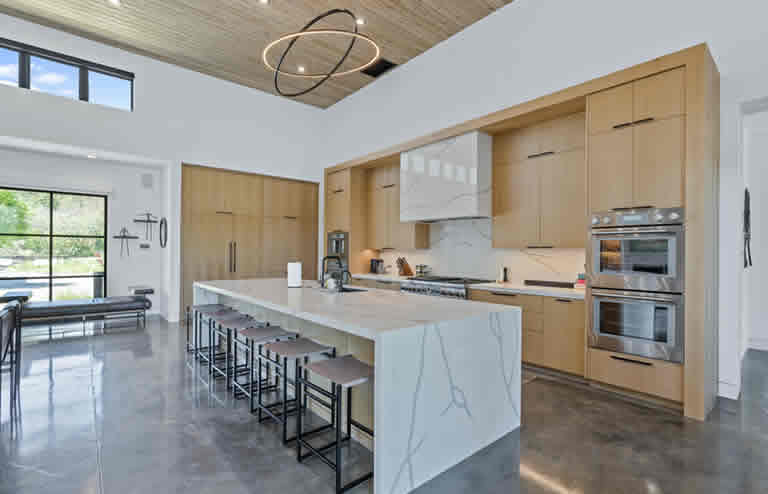 Modern luxury kitchen with marble island in a custom home in Phoenix, Arizona