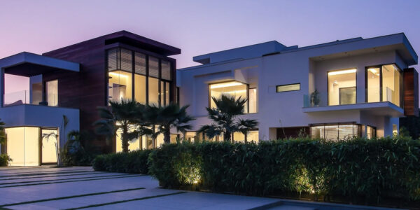 Modern custom home exterior built in Scottsdale AZ with desert landscape