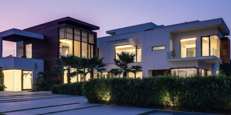 Modern custom home exterior built in Scottsdale AZ with desert landscape